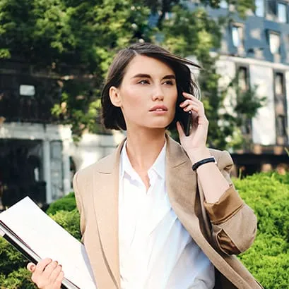 Woman looking confident while standing outdoors